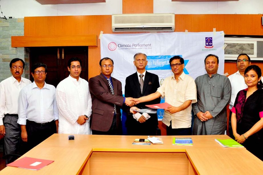 Treasurer of Dhaka University Prof Dr Md. Kamal Uddin and South Asia Regional Director of Climate Parliament Mukul Sharma singing a MoU on behalf of their respective institution on Sunday at the VC office of the University. DU VC Prof Dr AAMS Arefin Siddi