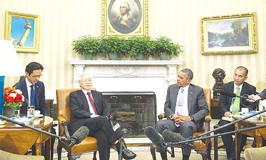 US President Barack Obama and Vietnam's Communist Party General Secretary Nguyen Phu Trong meet in the Oval Office at the White House in Washington on Tuesday.