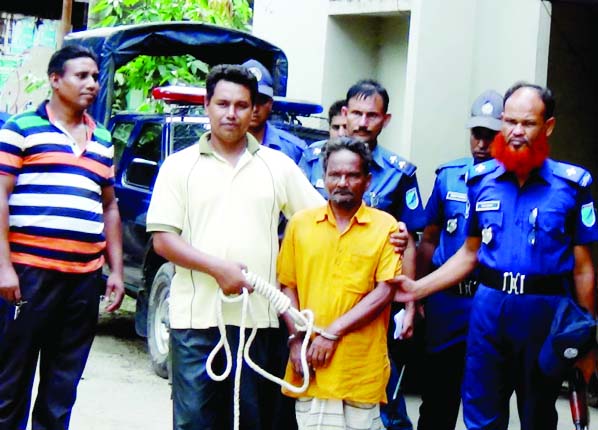 KISHOREGANJ: Md Moslem Prodhan an alleged war criminal being taken to Dhaka after arrest from Kamarkhani village in Kishoregan on Tuesday.