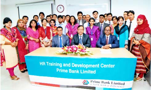 Head of Human Resources Division of Prime Bank SEVP Ziaur Rahman, EVP J H Shahedi and Head of HR-TDC SVP Kamruzzaman Khairul Kabir pose with the participants of a Foundation Training Course at its HR Training & Development Center that concluded recently
