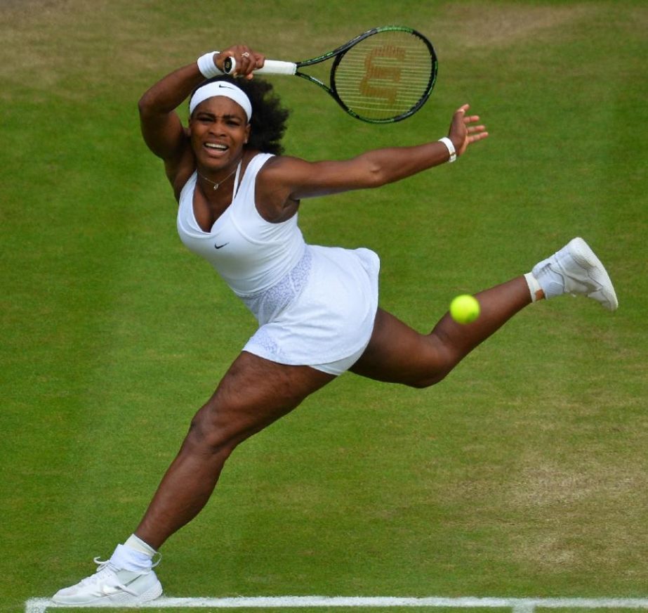 US player Serena Williams returns the ball to Belarus's Victoria Azarenka during their women's quarter-finals match at Wimbledon on Tuesday.