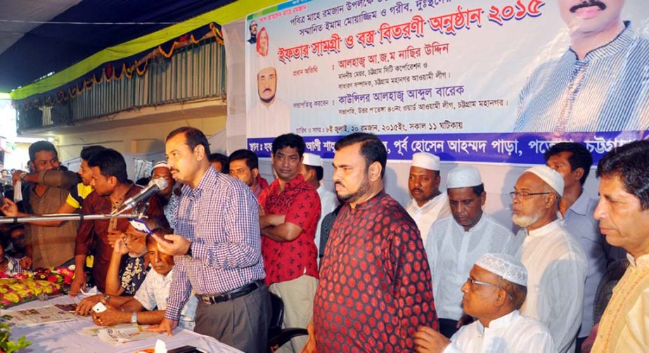 CCC Mayor AJM Nasir Uddin speaking as Chief Guest at an Eid items distribution ceremony at Ward No 40 in the city yesterday. The items were donated by Abdul Barek Company Ltd.