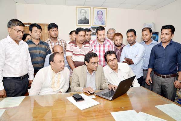 Pro-Vice Chancellor (with additional charge as Vice Chancellor) of National University Prof Dr Munaj Ahmed Noor inaugurating the e-Filing system of Integrated Software of the university recently while its College Inspectors, Director of ICT and other seni