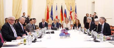 German Foreign Minister Frank Walter Steinmeier, left, French Foreign Minister Laurent Fabius, 2nd left, European Union High Representative for Foreign Affairs and Security Policy Federica Mogherini, 5th right,, U.S. Secretary of State John Kerry, 3rd rig