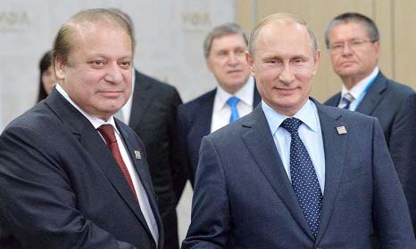 Russian President Vladimir Putin shakes hands with Pakistani Prime Miniser Nawaz Sharif during the SCO summit in UFA.