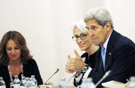 US Secretary of State John Kerry and US Under Secretary for Political Affairs Wendy Sherman, centre, meet with foreign ministers and representatives of Germany, France, China, Britain, Russia and the European Union during the current round of nuclear talk