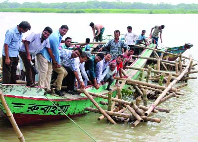BARISAL: Adv Sheikh Md Tipu Sultan MP, Babuganj inaugurating protection work of Barisal Airport from river erosion yesterday.