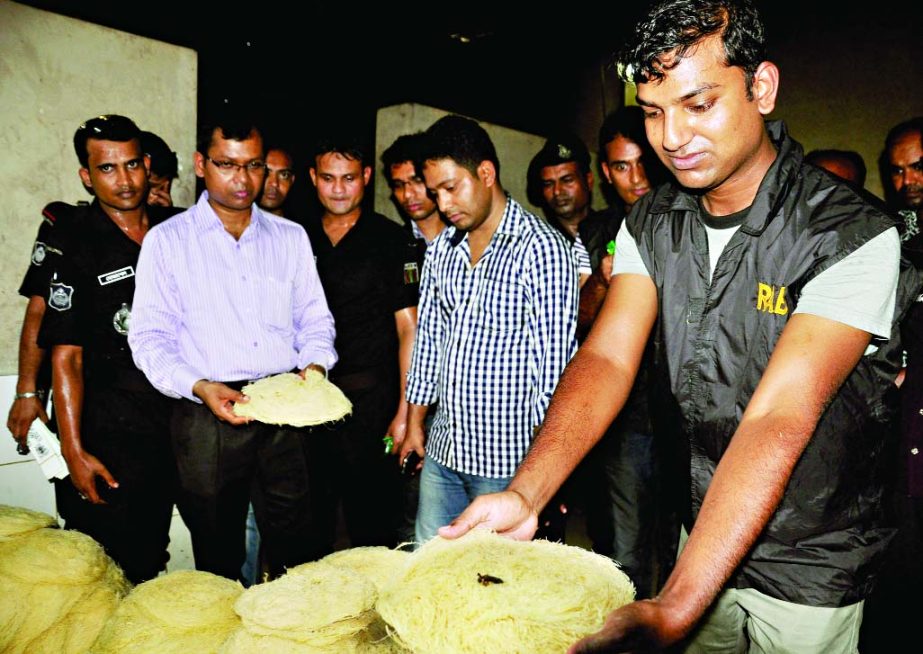 Owner of a vermicelli factory was fined Taka four lakh by a RAB mobile team led by a magistrate for producing the product in an open and unhygienic space. This photo was taken from city's Sanir Akhra area on Saturday.