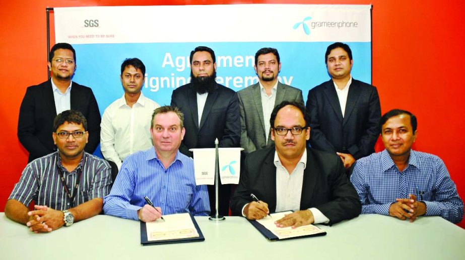 David Laizans, Country Manager of SGS Bangladesh Ltd and Sajjad Alam, Head of Direct Sales-Grameenphone, sign an agreement to provide complete communication solutions under business solutions package at the Grameenphone office recently.