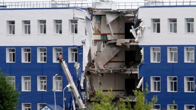 The four-storey building collapsed in the middle of the night