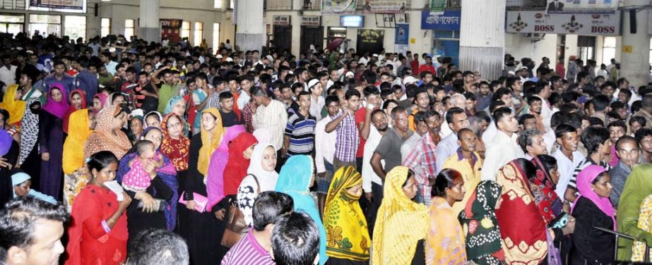 People are in queue for Eid tickets at Chittagong Rail Station on Sunday.