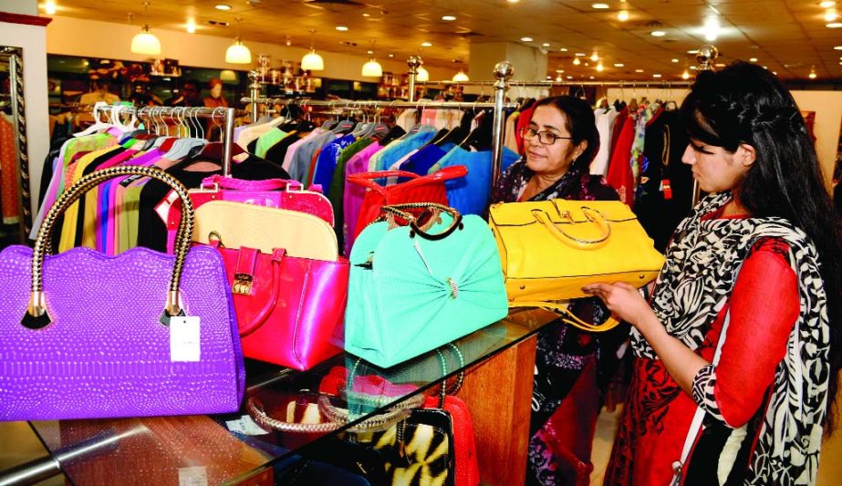 Buyers choosing their best buy at Bashundhara's Mantra Fashion House ahead of Eid. This photo was taken on Tuesday.
