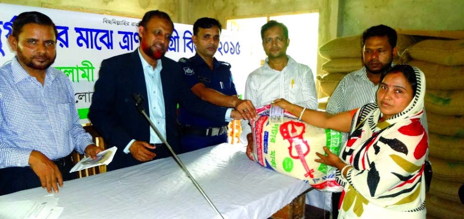 Mohammed Amirul Islam, EVP and Head of Chittagong South Zone of Islami Bank Bangladesh Limited, distributing relief among the flood-affected people of Lohagara area in Chittagong recently.