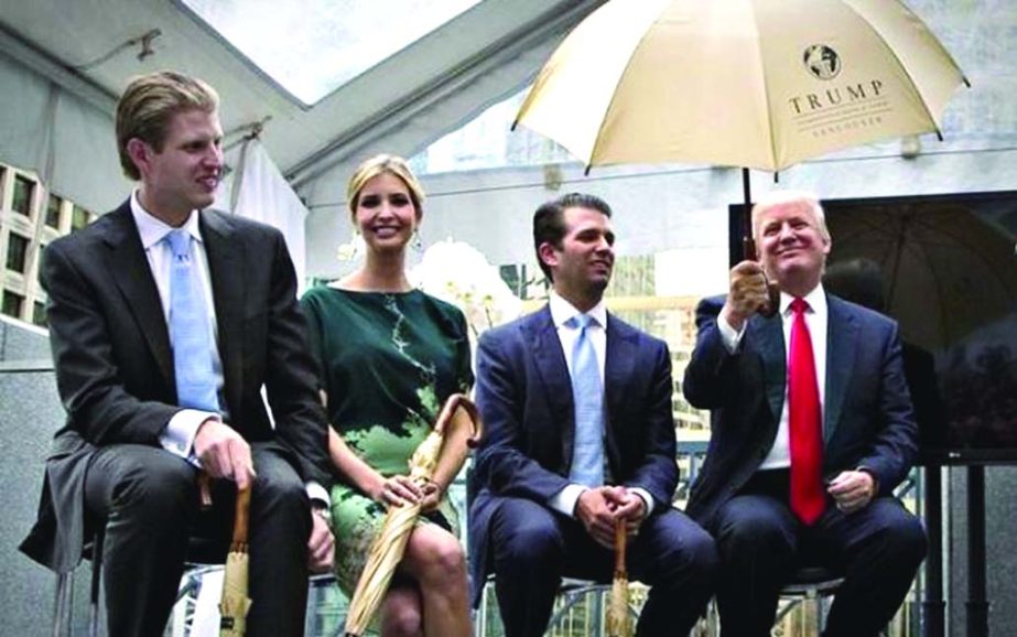 Donald Trump Â® along with his children Eric (L), Ivanka (2nd L) and Donald Jr attend a ceremony announcing a new hotel and condominium complex in Vancouver, British Columbia.