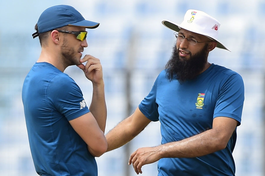 Hashim Amla (right) and Faf du Plessis have a chat during a practice session in Chittagong on Monday.