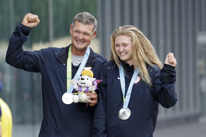 The United States' Mark Modderman (left) and Grace Modderman celebrate their silver medals in the Hobie 16 class during sailing competition in the Pan Am Games in Toronto on Sunday.