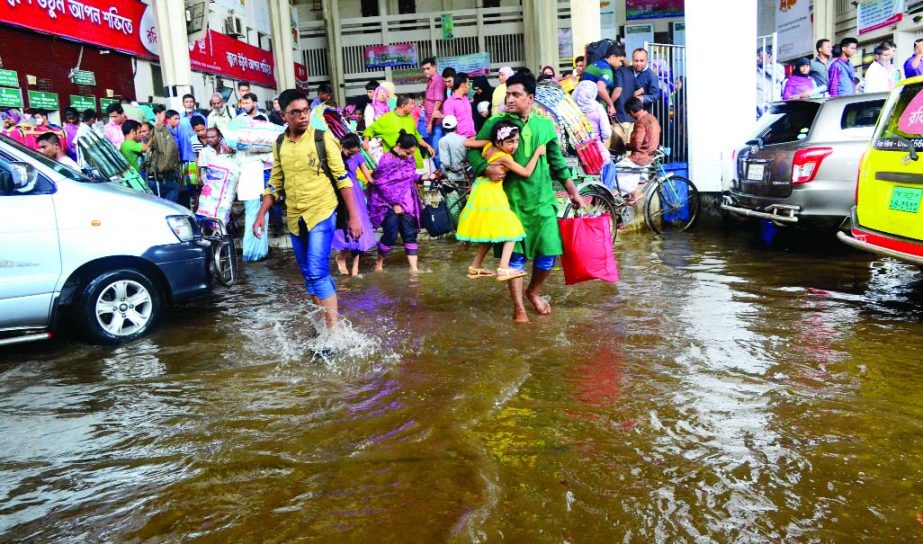 The passengers have been facing untold sufferings due to water-logging at the premises of Kamalapur Railway Station as the front portion, including car parking goes under ankle-deep water even after a short spell of rain due to absence of proper drainage