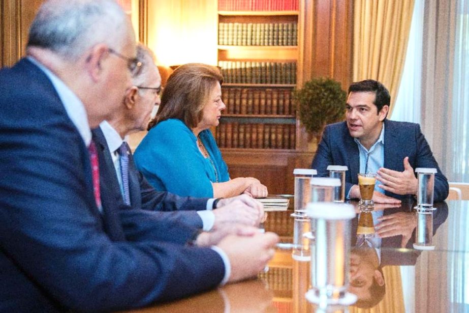 Alexis Tsipras (right) meets representatives of the union of Greek bankers at his office in Athens on Wednesday.