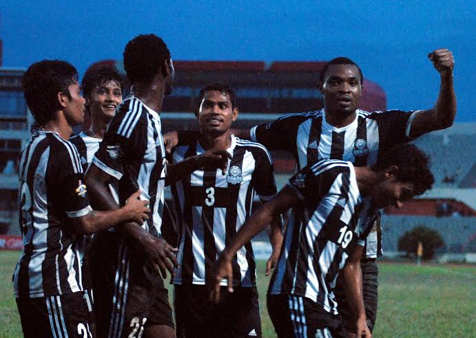 Players of Dhaka Mohammedan Sporting Club Limited celebrate after scoring a goal against Bangladesh Muktijoddha Sangsad Krira Chakra during their football match of the Manyavar Bangladesh Premier League at the Bangabandhu National Stadium on Wednesday. Th