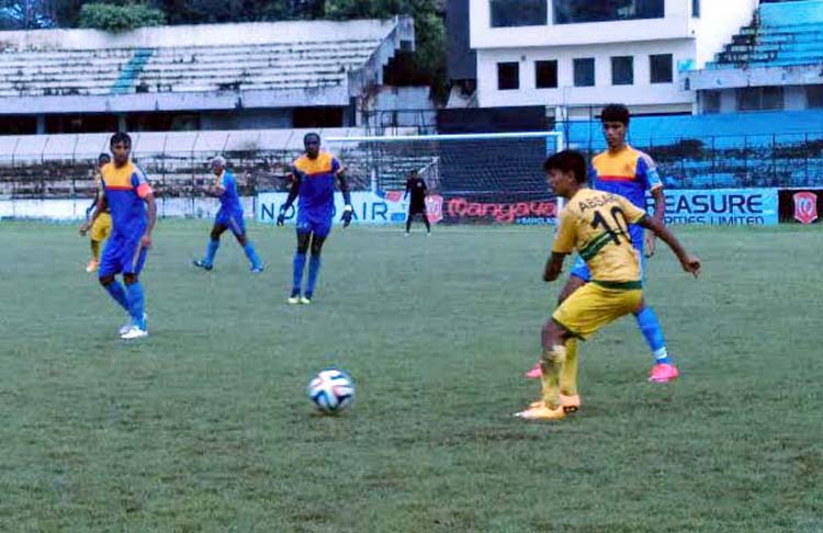 An action from the football match of the Manyavar Bangladesh Premier League between Chittagong Abahani Limited and Rahmatganj MFS at the MA Aziz Stadium in Chittagong on Wednesday. Chittagong Abahani won the match 1-0.
