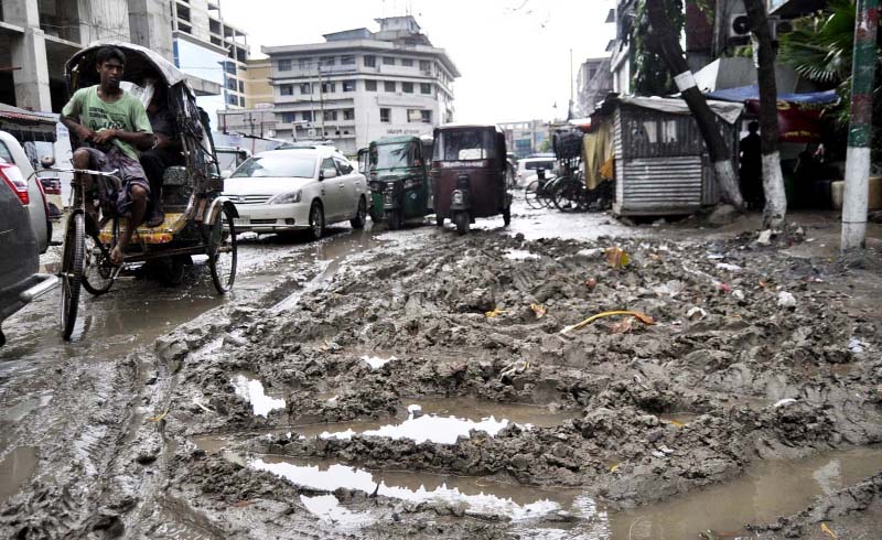 This road in Agrabad Commercial area has turned into a garbage ground and passers-by have to suffer a lot.