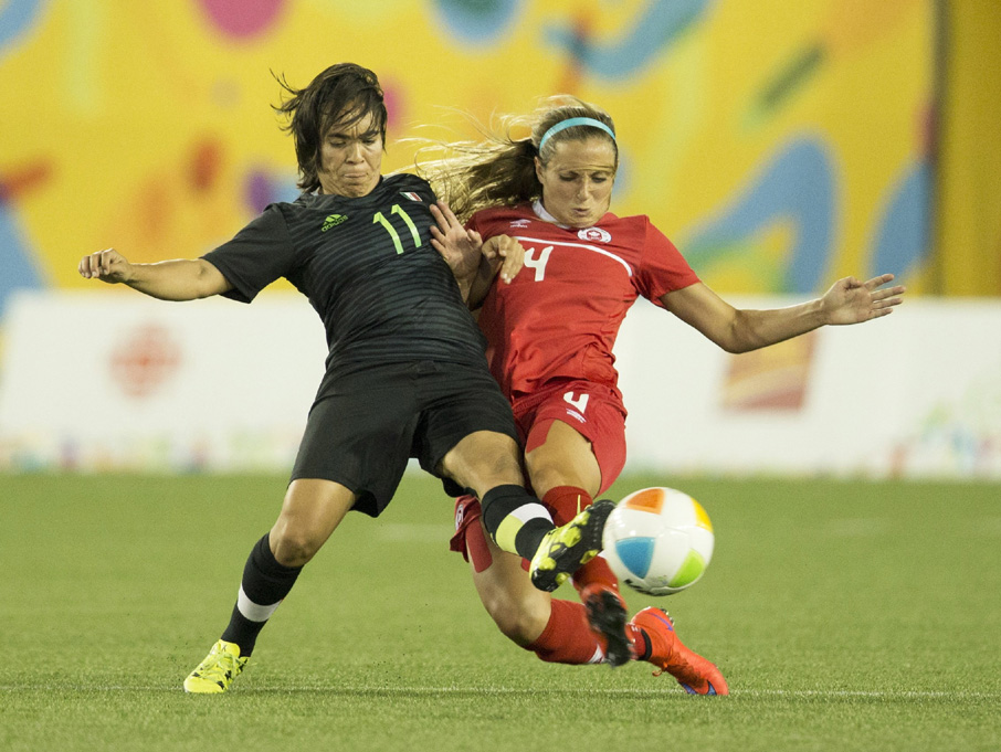 Canada's Shelina Zadorsky (right) and Mexico's Monica Ocampo vie for the ball during the second half of the Pan Am Games women's bronze medal soccer match in Hamilton, Ontario on Friday. Mexico won the bronze medal.