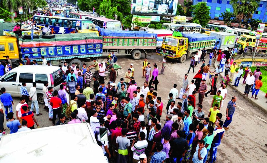 Thousands of Dhaka-bound commuters experienced untold sufferings on Saturday during their entrance in the city through the first Buriganga Bridge due to the transport workers' barricade on the bridge protesting toll hike.