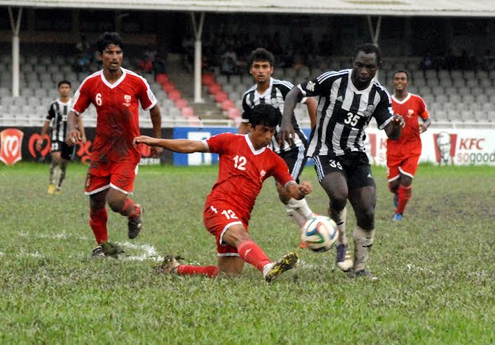 A moment of the football match of the Manyavar Bangladesh Premier League between Dhaka Mohammedan Sporting Club Limited and Soccer Club, Feni at the Bangabandhu National Stadium on Sunday. Mohammedan won the match 2-1.