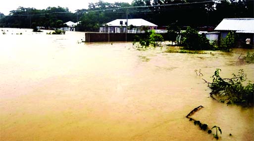 Several thousand people in different unions of Feni district have been marooned in flood water following collapse of two segments of the embankment on Muhuri River due to heavy rainfall for the last few days.