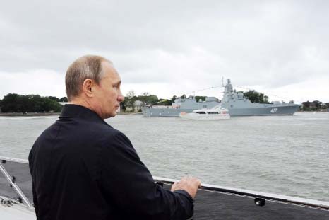 Russian President Vladimir Putin attends a ceremony marking Navy Day in Baltiysk in the Kaliningrad region.