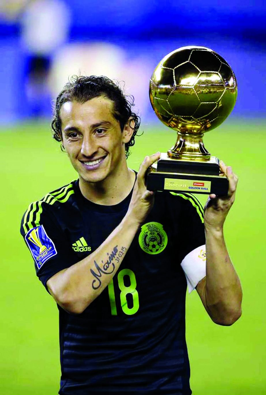 Mexico's Andres Guardado poses with the Golden Ball trophy after the CONCACAF Gold Cup championship soccer match against Jamaica in Philadelphia on Sunday. Mexico won the match 3-1.