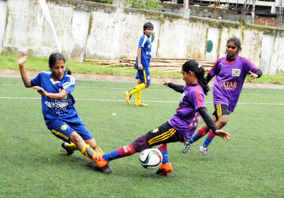 An exciting moment of JFA U-14 Women's National Football Championship 2015 between Dinajpur Women's District team and Satkhira Women's District team at the BFF Artificial Football ground on Monday.