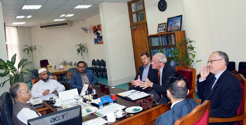 UGC Chairman Prof Abdul Mannan is seen discussing with the delegation members from British Council Bangladesh at his office on Tuesday.
