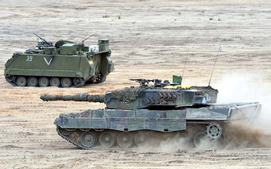 Tanks drive during a NATO Response Force exercise in Zagan, southwest Poland.