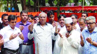 RANJBARI: Akbar Ali Morgi, Administrator, Zilla Parishad offering Munajat after inaugurating a rest house at Goalando Upazila on Wednesday.