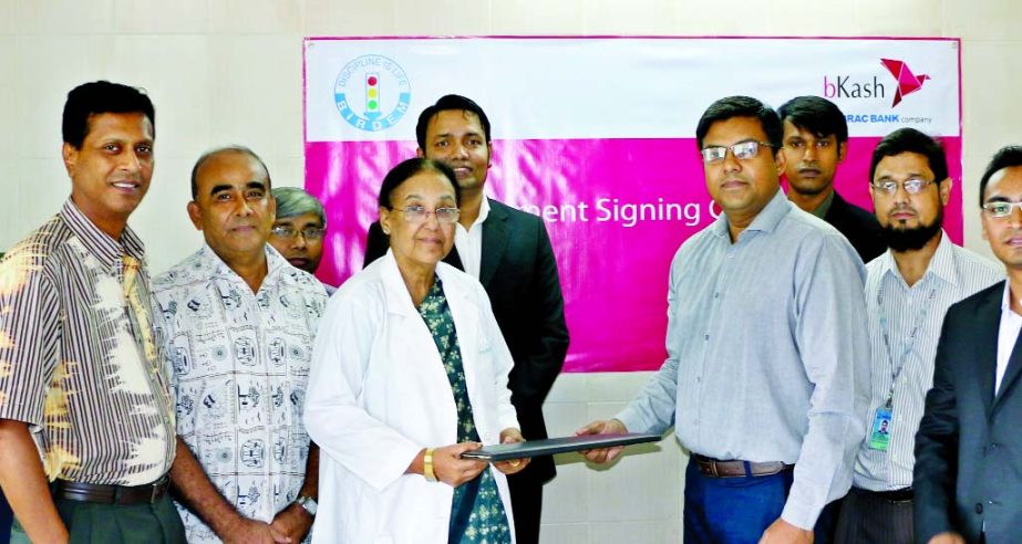 Rezaul Hossain, Chief Commercial Officer of bKash and Prof Nazmun Nahar, Director General of BIRDEM, sign an agreement to facilitate the patient's payment through bKash at BIRDEM recently.