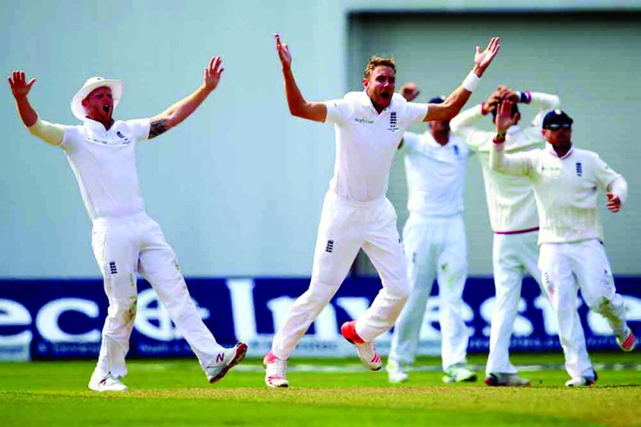 Stuart Broad (2L) of England leads an unsuccessful appeal for the wicket of Peter Nevill during day three of the 3rd Investec Ashes Test match between England and Australia at Edgbaston in Birmingham, United Kingdom on Friday.