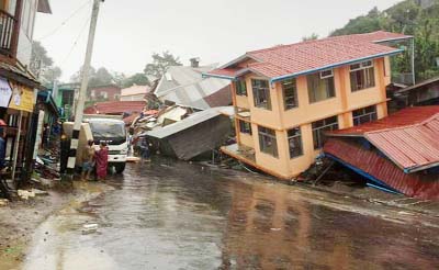 Apartments are destroyed following a landslide due to heavy rain in Harkhar, Chin State of Myanmar.