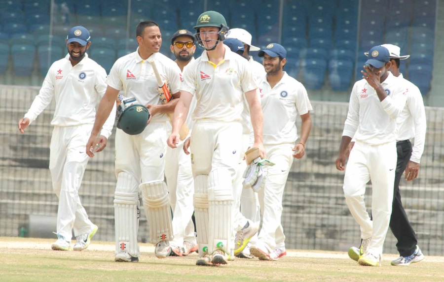 Usman Khawaja and Cameron Bancroft walk off after sealing Australia A's win against India A in the 2nd unofficial Test at Chennai on Saturday.