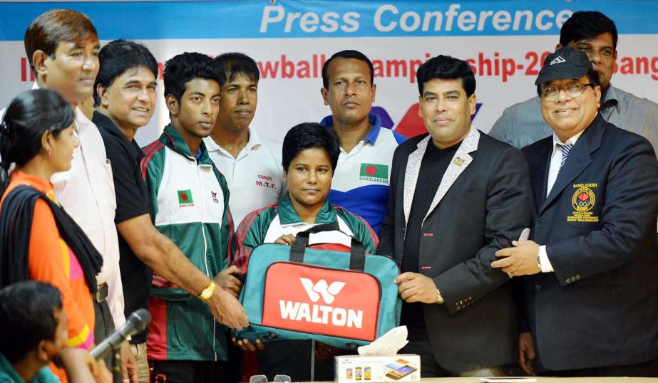 First Additional Director of Walton FM Iqbal Bin Anowar Dawn handing over tournament dress to Bangladesh Throwball team on Saturday.