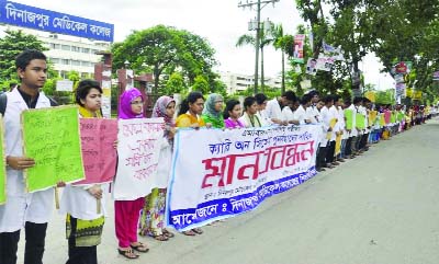 DINAJPUR: Students of Dinajpur Medical College formed a human chain demanding restoration of 'carry on system' on Saturday.