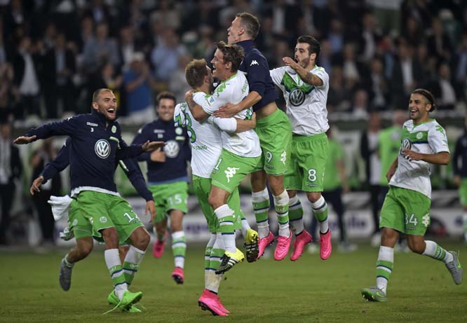 Wolfsburg players celebrates after winning the German Supercup final soccer match between VfL Wolfsburg and Bayern Munich in Wolfsburg, Germany on Saturday. Wolfsburg defeated Bayern with 6-5 after penalties.