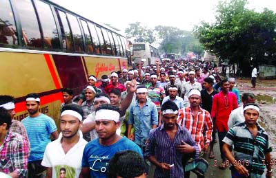 BARISAL: Labourers brought out a procession in Gouruinodi Upazila protesting ban on plying three wheelers on highway on Saturday.