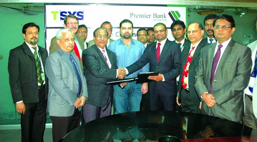 Khondker Fazle Rashid, Managing Director of Premier bank and Amit Basant, regional head, RM India and South Asia of TSYS International, sign an agreement for implementation of Card Management System (CMS) at the bank's head office recently. Mohammad Imra