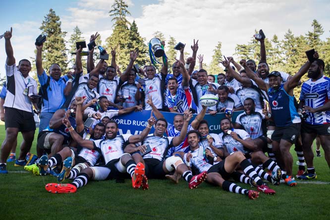 Fiji players celebrate after defeating Samoa to win the Pacific Nations Cup rugby championship in Burnaby, British Columbia on Monday.