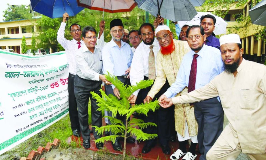 Badiur Rahman, Chairman of Al-Arafah Islami Bank Ltd, inaugurating 'Tree Plantation Campaign 2015' by Barisal branch of the bank under its Green Banking program at AK School premises recently. Director Abdul Malek Mollah and Managing Director Md. Habibu