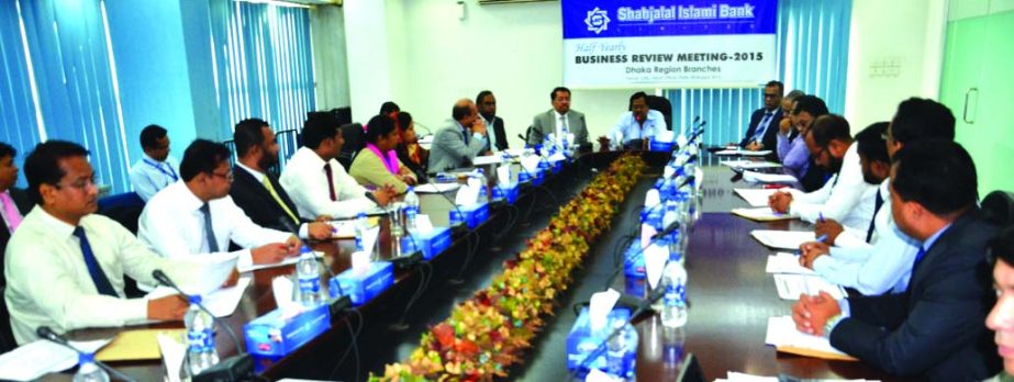 Mohammad Younus, Vice-Chairman of the Board of Directors of Shahjalal Islami Bank Limited, presiding over the "Half Yearly Business Review Meeting-2015" of Dhaka regional branches of the bank at its head office on Wednesday. Managing Director Farman R C