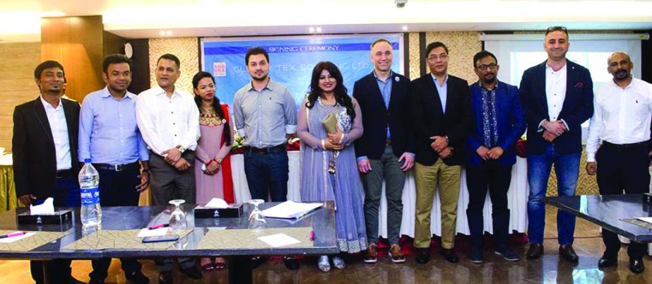 Picture shows after signing a deal recently for opening Lufian (a men's wear shop), a Turkish signature fashion brand, branch in Bangladesh soon.