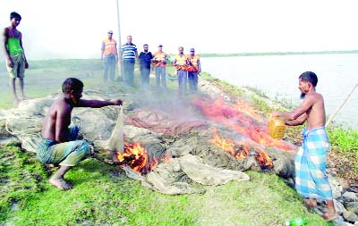 PATUAKHALI: Coastguard seized huge current nets from Paira River and it was set on fire on Wednesday.