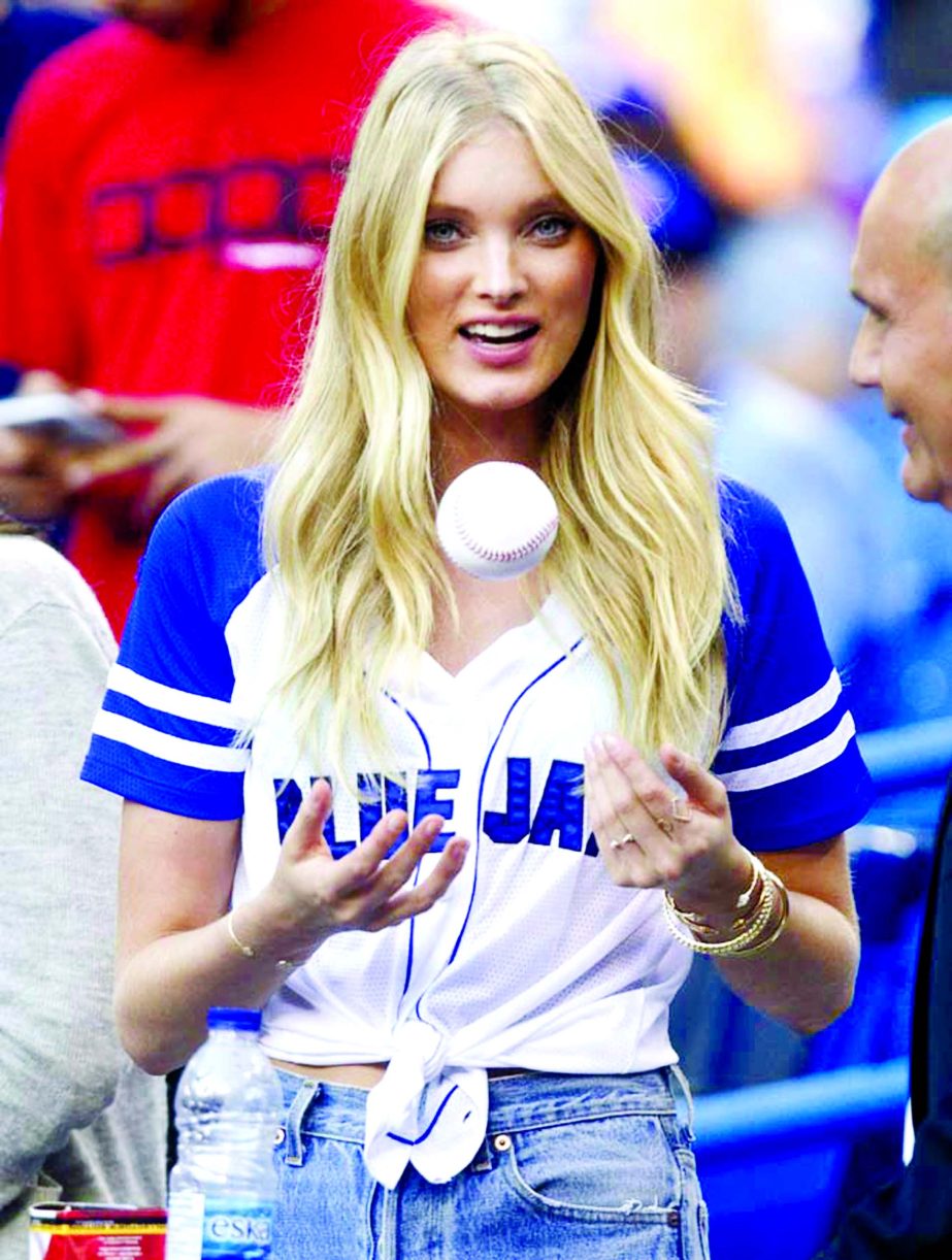 Model Elsa Hosk waits to throw out the first pitch before a baseball game between the Toronto Blue Jays and the Minnesota Twins in Toronto on Thursday.